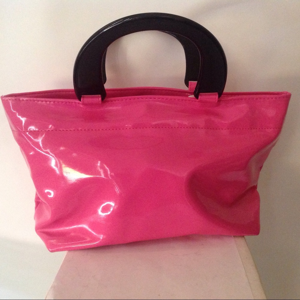 Pink vinyl tote with black lucite handles